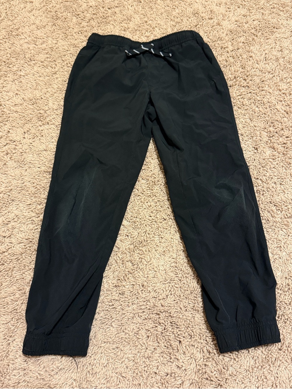 DSG Boys lightweight pants in black, size XS (6/7)